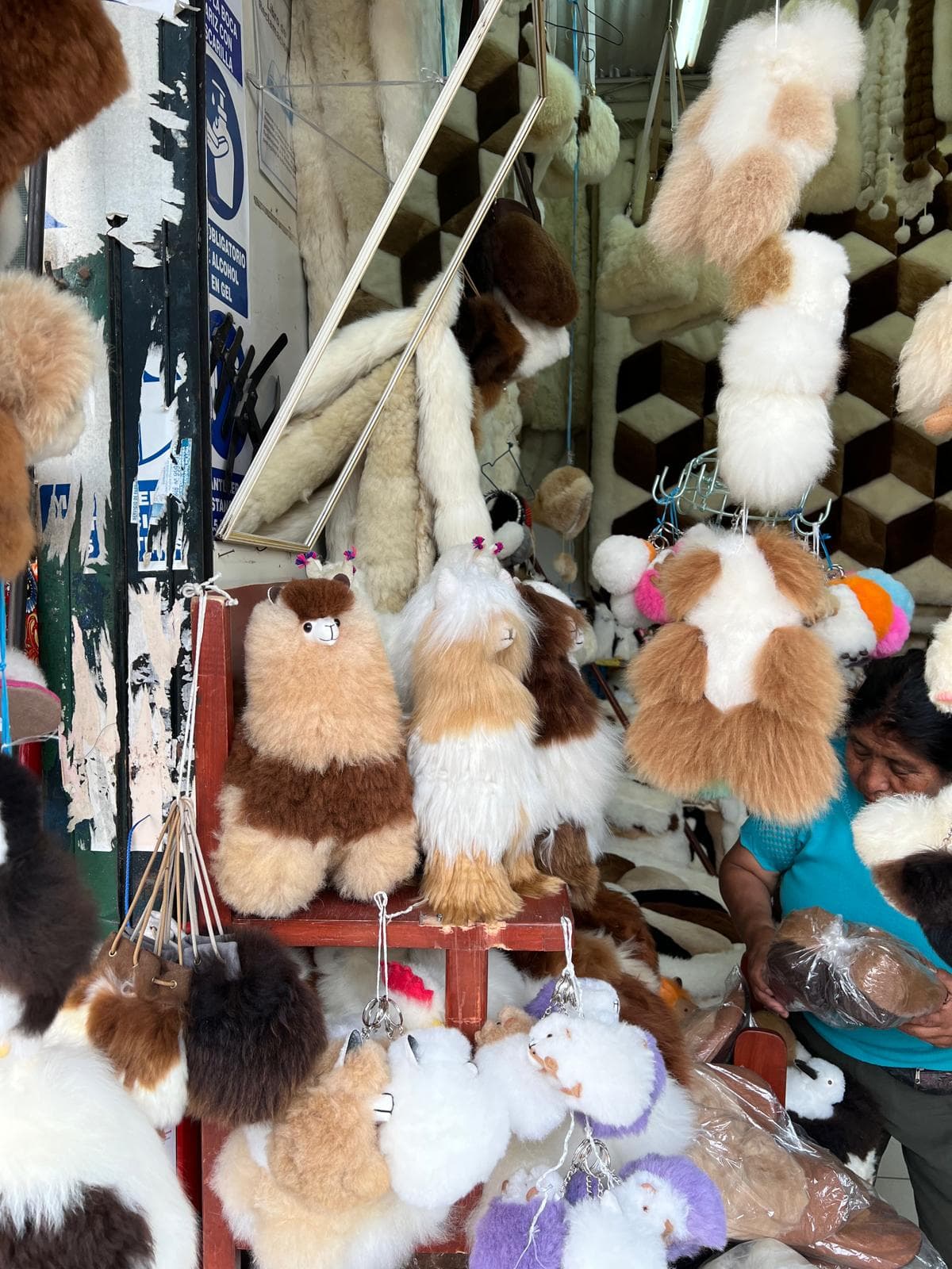Inkari plush alpacas on a market stall in Peru
